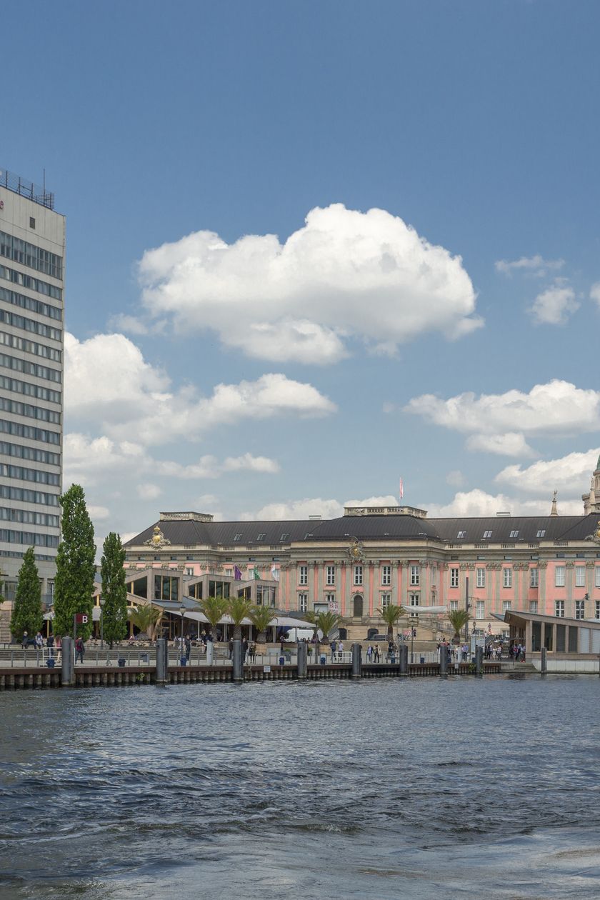 View of Potsdam harbor with Mercure Hotel, state parliament and St. Nicholas Church in the background